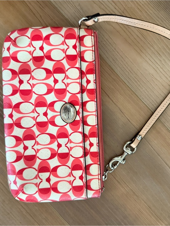 Coach Handbags - Coach Coral & White Signature Print Wristlet